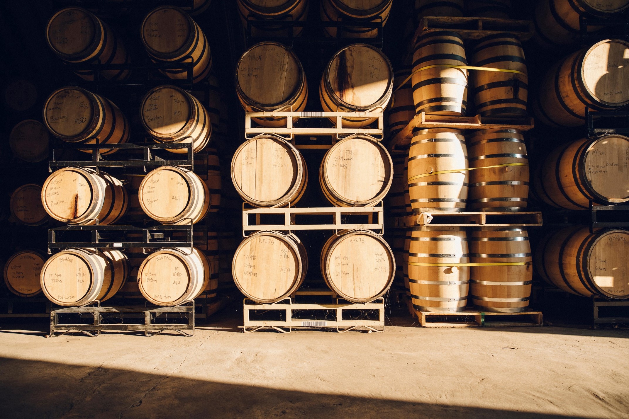 Winery Insurance Winery Barrels stacked in a wine room.